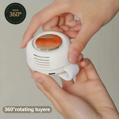 PocketBreeze clip-on mini fan with 360-degree rotating outlet